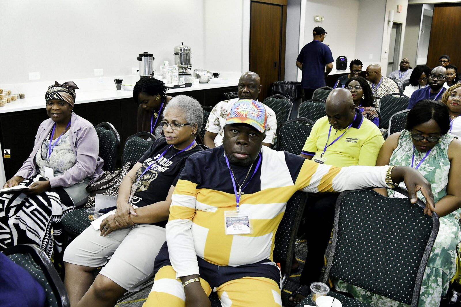 Attendees seated in rows at the convention