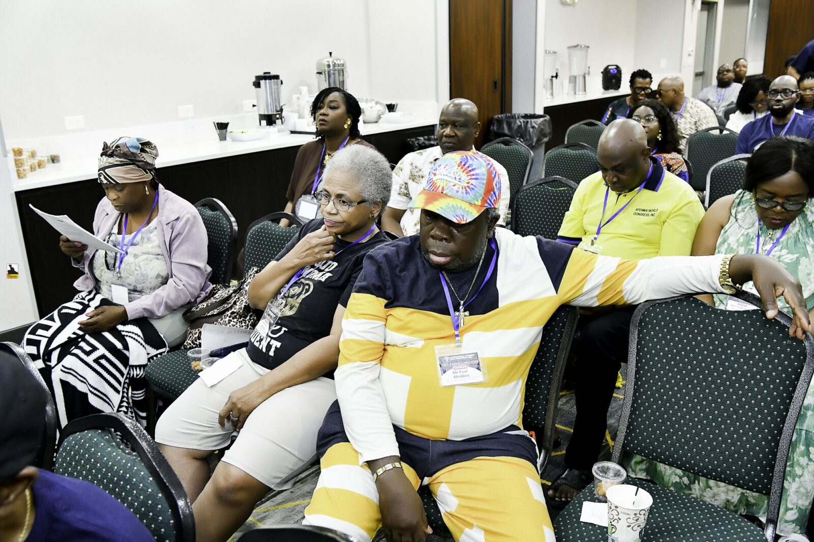 Attendees seated in rows at the convention