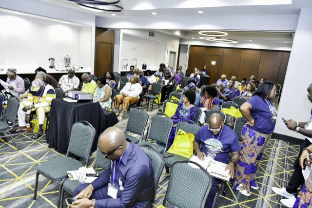 A view across the seated convention audience