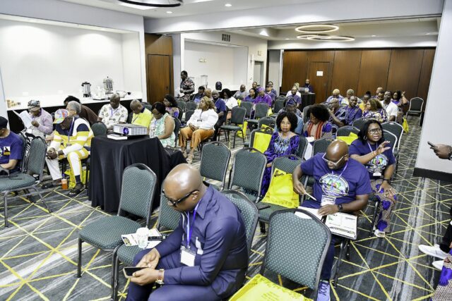 A view across the seated convention audience