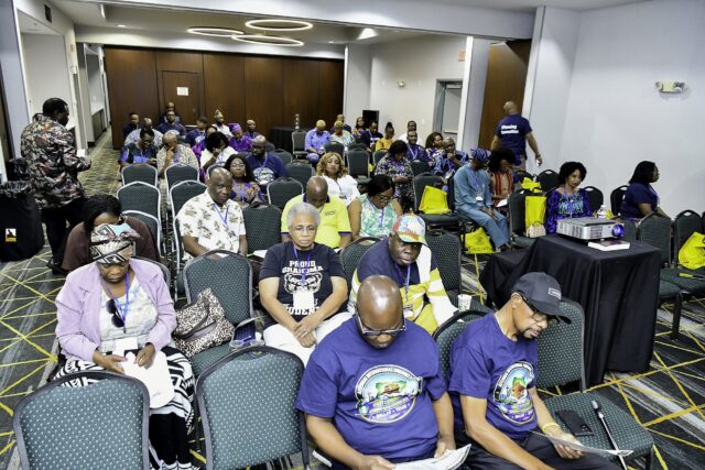 A view across the seated convention audience