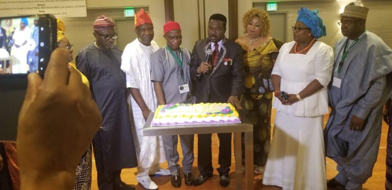 A cultural celebration moment at an AWC gathering.
